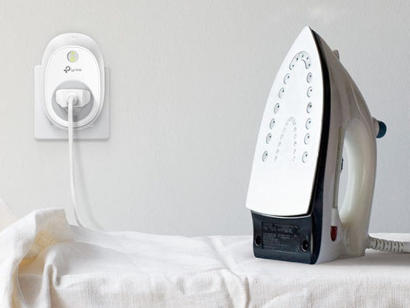 steam iron plugged into wall